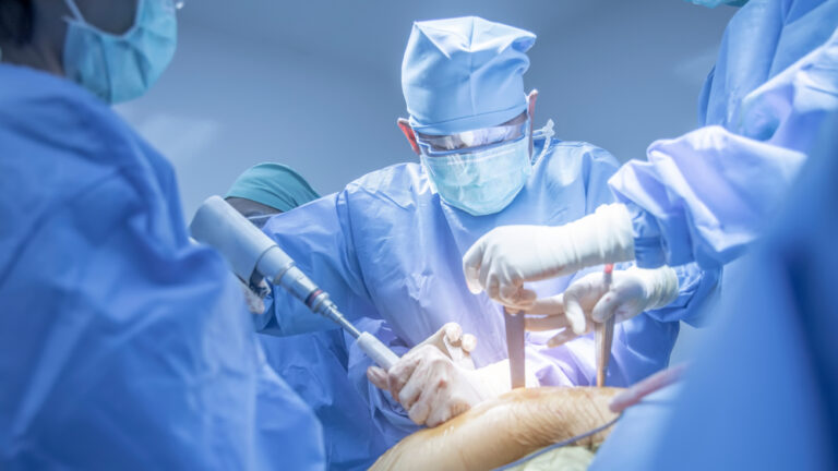 Team,Of,Doctor,Doing,Surgery,Inside,Modern,Operating,Room,With
